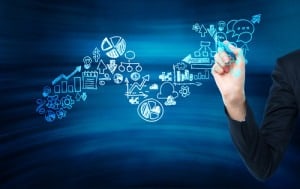 Businessman is drawing a futurist blue growing arrow on the glass screen. Business icons as an integral part of the growing graph.